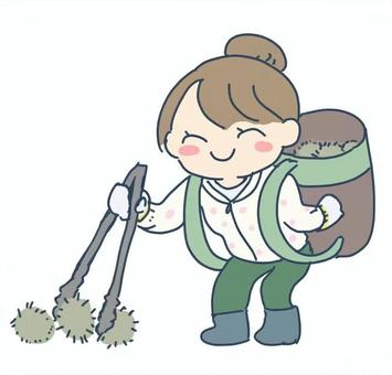 栗拾いをする女性
