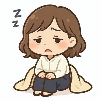 寝不足で目をシバシバさせている女性