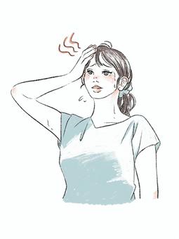 汗をかく女性
