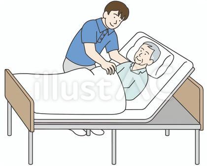 ベッドで介護する男性
