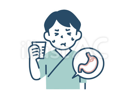 バリウムを我慢して飲んでいる男性