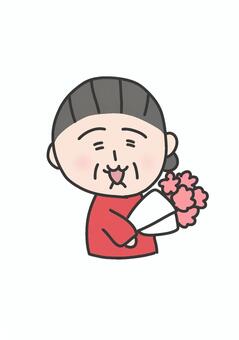 花束を持っているおばあちゃんのイラスト おばあさん,花束,お年寄り,高齢者,人物,敬老の日,かわいい,イラストのイラスト素材