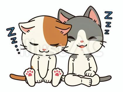 並んでうたた寝している可愛いぶち猫たち
