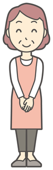 正面を向いて微笑んでいるおばさん 微笑む,女性,人,主婦,中年,シニア,エプロン,ママ,お母さん,おかんのイラスト素材