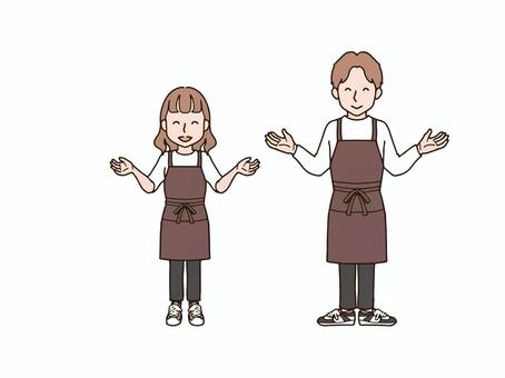 両手を広げる男女_エプロンbr 大人,男性,男女,女性,ペア,おそろい,全身,エプロン,ズボン,パンツのイラスト素材