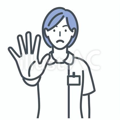 制止のポーズをとる女性看護師