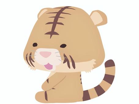 座っている笑顔のトラ