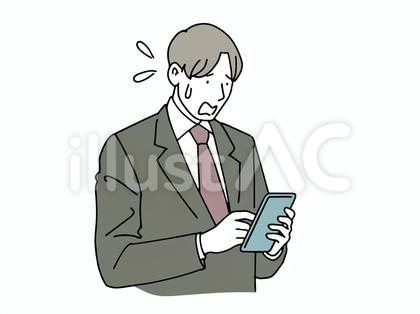 スマホを使っていて焦る男性会社員