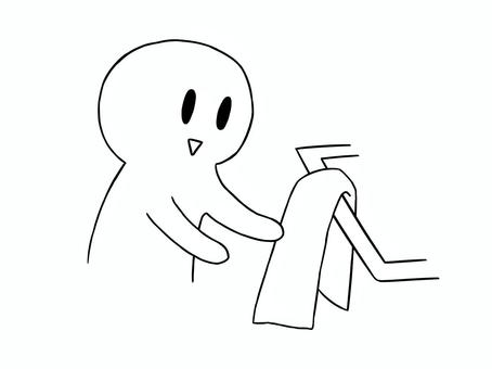 タオルで手をふく人