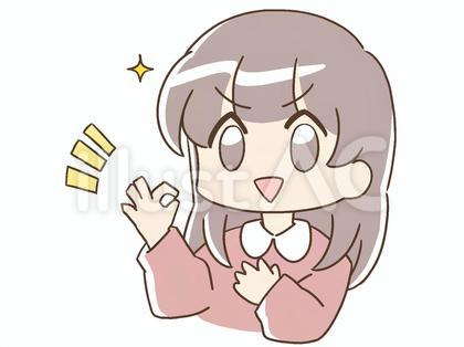凛々しい表情で指でOKサインを作る女性