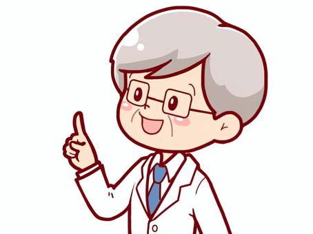 指差しをする白衣の男性