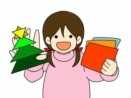 クリスマスツリーの折り紙と女の子