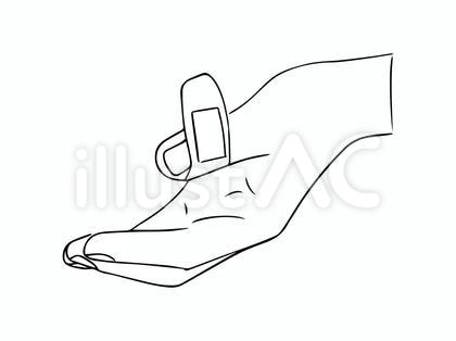 モノクロの絆創膏を貼る手元