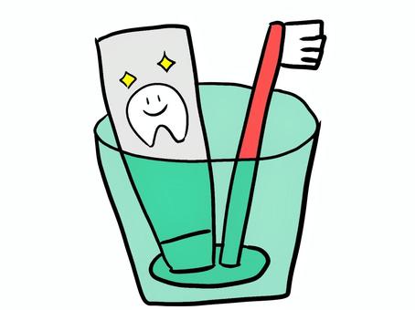 歯磨きセット 歯磨きセット,歯ブラシ,コップ,歯磨き粉,手描きのイラスト素材
