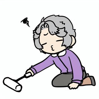 コロコロをかける不満なおばあさん コロコロをかける不満なおばあさん おばあさん,コロコロ,掃除,不満,いやいや,不本意,やりたくない,義務,役割,趣味のイラスト素材