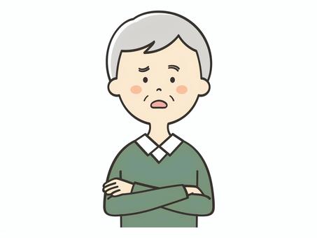 困った表情のおじいさん