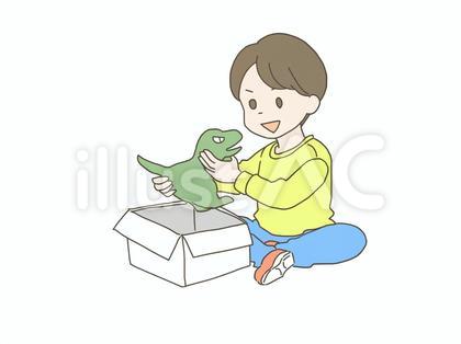 プレゼントを開ける少年