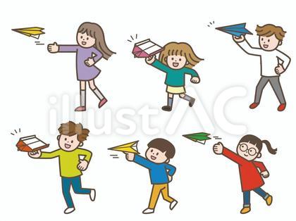 紙ひこうきを飛ばす小学生