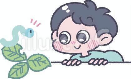 葉っぱに乗った青虫と笑顔の男の子