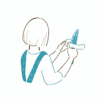 大根の皮剥きをする女の子 皮剥き,大根,料理,下ごしらえ,手伝い,女の子,女性,手書き風のイラスト素材