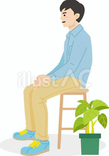 腰掛ける青年