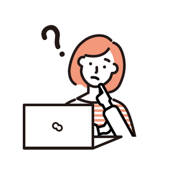 パソコンの前で考える女性