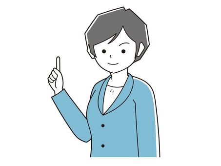 ポイントを指さしするスーツの女性