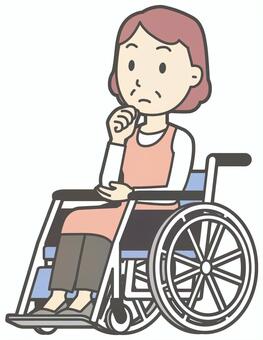  車椅子に乗って考えている中年の女性 考える,おばさん,人,女性,中年,おばちゃん,シニア,ママ,主婦,ヘルパーのイラスト素材