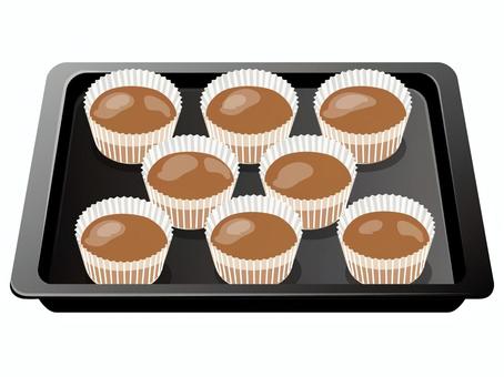 カップケーキ型に流したチョコケーキ生地 ケーキ生地,チョコ,カップケーキ型,カップケーキ,お菓子作り,料理,食べ物,天板のイラスト素材