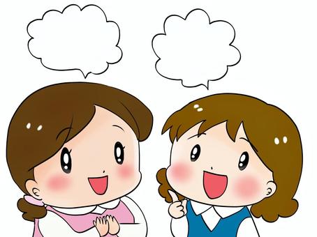 楽しそうに何かを話す女性たち