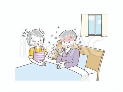 熱が出て咳をする夫を心配する妻