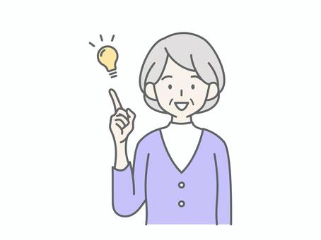 良いことをひらめくシニア女性 良いことをひらめくシニア女性 人物,女,祖母,おばあちゃん,老人,高齢者,お年寄り,シニア,白髪,思いつくのイラスト素材