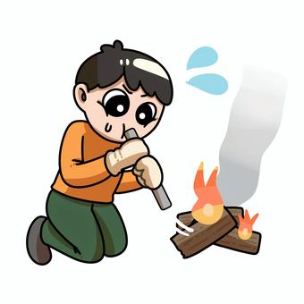 火をおこす小学生