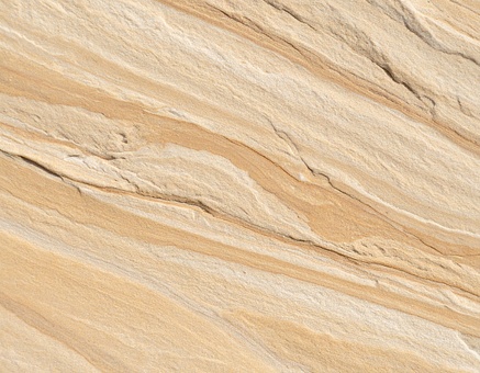 ベージュと茶色が混じった砂石のテクスチャ