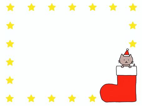 クリスマスのフレーム・靴下の中の猫 フレーム,枠,クリスマス,星,猫,囲み枠,飾り枠,見出し,タイトル,あしらいのイラスト素材