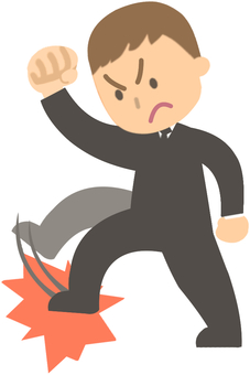 怒りをもって何かを踏みつけるスーツ男性2