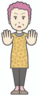  両手を差し出して止めているおばちゃん ストップ,真剣,おばちゃん,大阪,ヒョウ柄,おばはん,中年,女性,関西,派手のイラスト素材