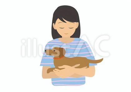 ダックスフンドを抱く女性