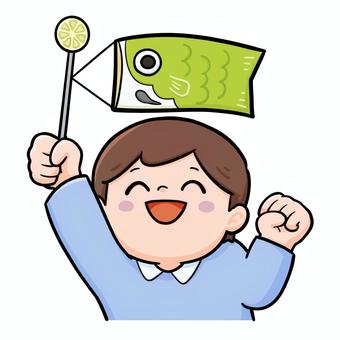 こいのぼりを持っている男の子