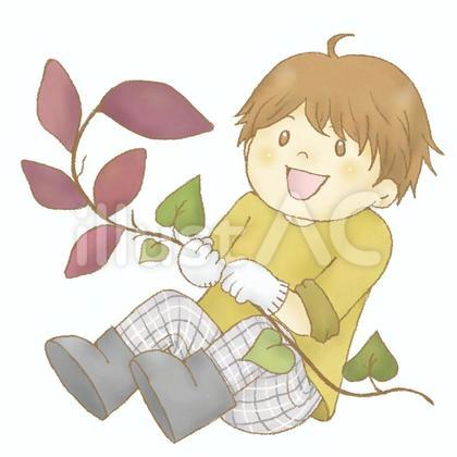芋掘りをする男の子