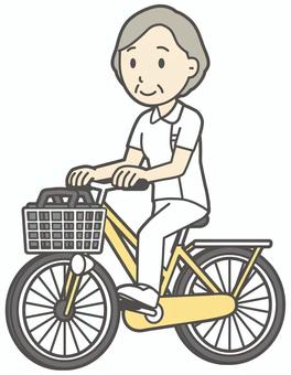  高齢看護師-473-全身 自転車,プラチナナース,看護師,高齢,女性,老人,白衣,ナース,医療,病院のイラスト素材