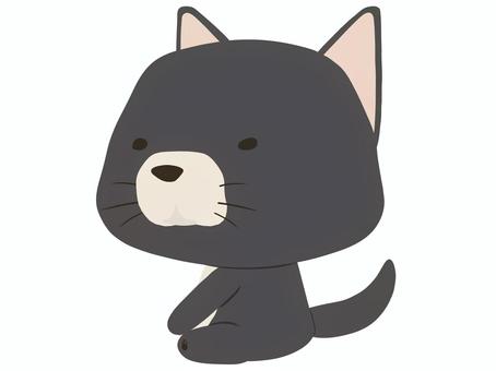 座っている黒い犬