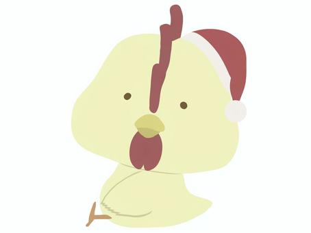 サンタ帽をかぶった鶏