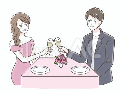 レストランで乾杯する男女カップル