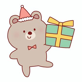 クリスマスプレゼントを持ったくま クリスマス,プレゼント,くま,動物,サンタ,帽子,持つ,線画,可愛い,ゆるいのイラスト素材