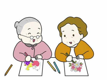 デイサービスでぬり絵をする高齢者２人 デイサービス,レクリエーション,ぬり絵,色鉛筆,カラフル,高齢者,高齢女性,老人,なかよし,楽しいのイラスト素材