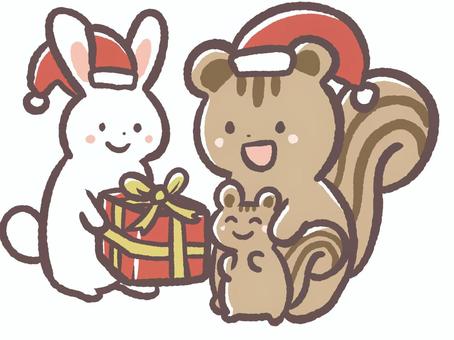 冬のクリスマスでプレゼント交換する動物