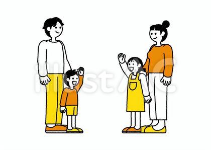 手を振り挨拶を交わす子どもたちとその親