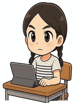 タブレットで勉強する少女