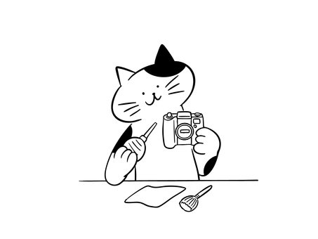 カメラの手入れをする猫（モノクロ） 猫,カメラ,カメラマン,フォトグラファー,一眼レフ,ミラーレス,清掃,ブロアー,クリーニング,クロスのイラスト素材